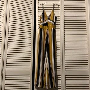 Yellow, black, white and red jumpsuit